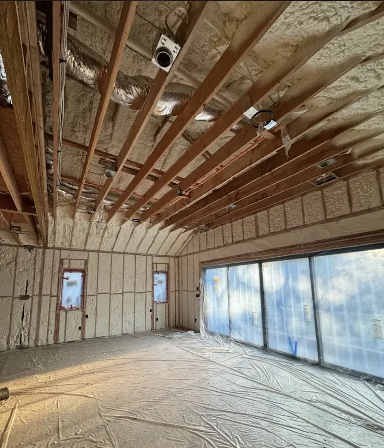 Interior walls and ceiling insulated with spray foam during new construction in Seaside